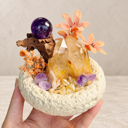 Handheld view of the citrine and amethyst garden showing its compact bowl size